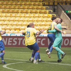 Team celebrating a goal at Norwich City