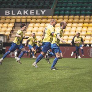 Celebrations on the field at Norwich City Football Club