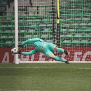 Goalkeeper diving for a save