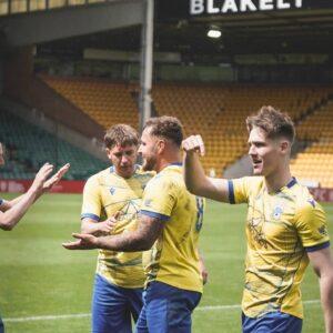 Team Celebrating at Norwich City Football Club