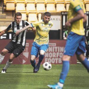 Shot of player making a run at goal during the final at Norwich City Football Club