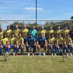 Norton Athletic line up with their winning trophies